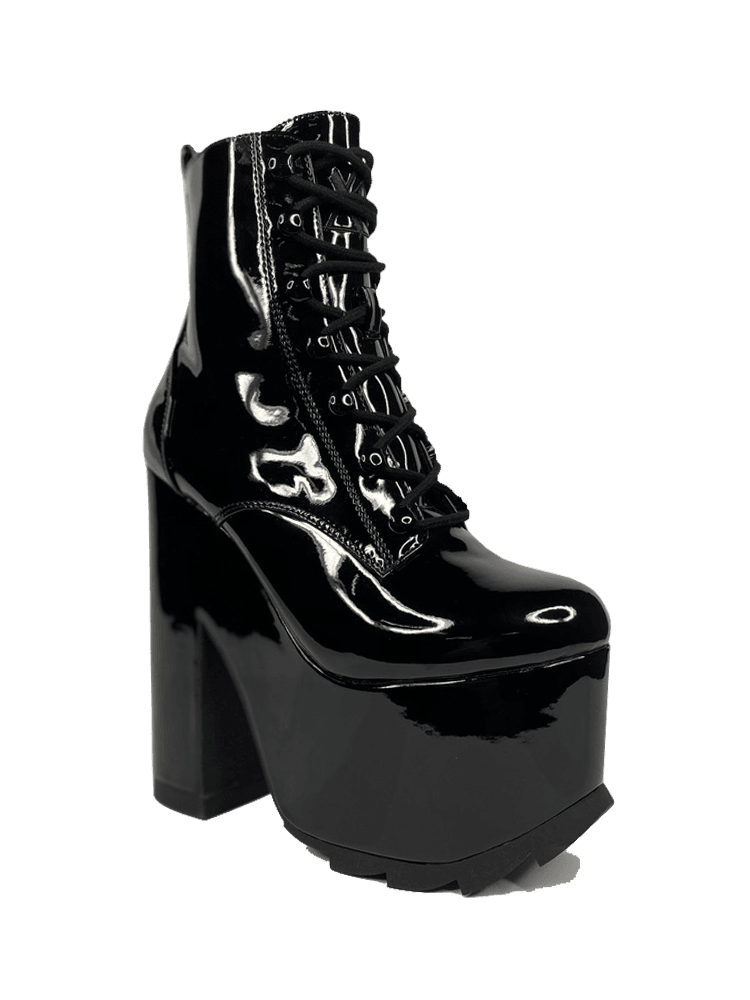 outer view of Black vegan shiny patent leather tall military style platform boot with black cotton laces and black inner zipper. Front of platform has a fanned grip for better stability when walking.