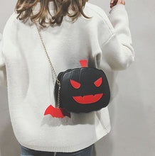 Load image into Gallery viewer, Front view of black pumpkin jack o&#39; lantern bag
