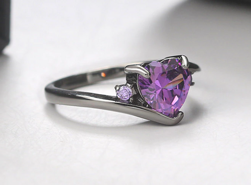 Black band with purple cubic zirconia heart.