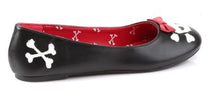 Load image into Gallery viewer, outer side view of Black vegan leather flats with skull and crossbone with red bow on front center of toe and cross bones on back left/right of shoe.
