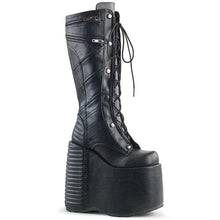 Load image into Gallery viewer, outer side view of black vegan leather 7&quot; platform Full lace-up front, no zipper Knee high boot Features moto jacket inspired stitching and ornamental zipper details
