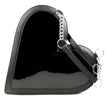 Load image into Gallery viewer, back view of heart shaped glossy black bag with a stitched spiderweb design at the bottom, chain link hardware and faux leather straps.
