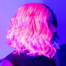 Load image into Gallery viewer, model showing hair dye in hair under blacklight
