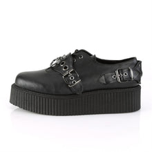 Load image into Gallery viewer, left side view of black vegan leather 2 inch platform creeper with O ring design on the front and adjustable straps on both sides of front of shoe, with hidden lace up underneath and bat ring adjustable strap on outside of shoe. has secret hidden coffin shaped compartment underneath sole cover inside shoe
